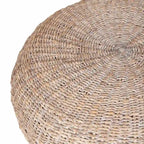 Okrągły puf-stolik kawowy z abaki w naturalnym bielonym kolorze